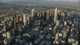 7.6K aerial stock footage flying over Aon Center and approach heavy 110 traffic in Downtown Los Angeles, California Aerial Stock Footage | AX0162_039E