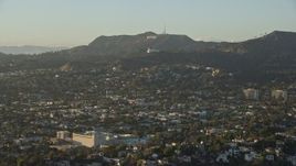 7.6K aerial stock footage flying over Los Felix to approach Hollywood Sign and Griffith Observatory in Los Angeles, California Aerial Stock Footage | AX0162_046E