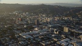 7.6K aerial stock footage flying by office buildings in Hollywood, California Aerial Stock Footage | AX0162_056