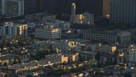 7.6K aerial stock footage of an LAPD helicopter flying over Hollywood and Koreatown, California Aerial Stock Footage | AX0162_057E