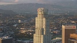 7.6K aerial stock footage orbiting US Bank Tower at sunset in Downtown Los Angeles, California Aerial Stock Footage | AX0162_079