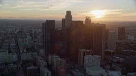 7.6K aerial stock footage orbiting the tall skyscrapers of downtown at sunset in Downtown Los Angeles, California Aerial Stock Footage | AX0162_087E
