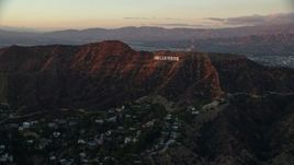 7.6K aerial stock footage of the Hollywood Sign in Los Angeles, California at twilight Aerial Stock Footage | AX0162_100