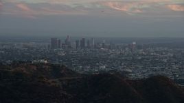 7.6K aerial stock footage of Downtown Los Angeles, California at twilight, reveal Griffith Observatory Aerial Stock Footage | AX0162_105