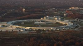 4K aerial stock footage of the Advanced Photon Source at the Argonne National Laboratory at sunset in Lemont, Illinois Aerial Stock Footage | AX0163_0007