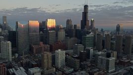 4K aerial stock footage of approaching  skyscrapers reflecting the sunset, Downtown Chicago, Illinois Aerial Stock Footage | AX0163_0029