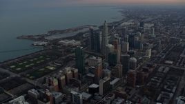 4K aerial stock footage of Grant Park and the Field Museum at twilight, Downtown Chicago, Illinois Aerial Stock Footage | AX0163_0042