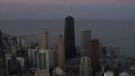 4K aerial stock footage approach John Hancock Center at twilight in Downtown Chicago, Illinois Aerial Stock Footage | AX0163_0053