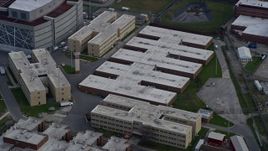 4K aerial stock footage of orbiting buildings at the Cook County Jail complex in West Side Chicago, Illinois skyline Aerial Stock Footage | AX0165_0021