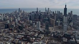4K aerial stock footage of flying by the Downtown Chicago, Illinois skyline Aerial Stock Footage | AX0165_0026