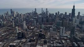 4K aerial stock footage of flying by the Downtown Chicago skyline, Illinois Aerial Stock Footage | AX0165_0027