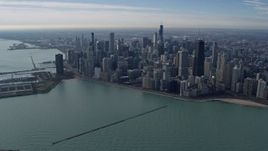 4K aerial stock footage of tall, waterfront skyscrapers and Navy Pier in Downtown Chicago, Illinois Aerial Stock Footage | AX0165_0032