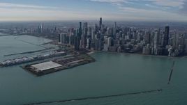 4K aerial stock footage of Navy Pier and waterfront skyscrapers in Downtown Chicago, Illinois Aerial Stock Footage | AX0165_0033