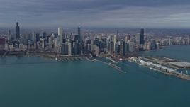 4K aerial stock footage of waterfront skyscrapers and Navy Pier in Downtown Chicago, Illinois Aerial Stock Footage | AX0165_0036