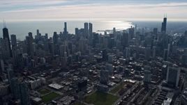 4K aerial stock footage of flying by and approaching the city's tall skyscrapers in Downtown Chicago, Illinois Aerial Stock Footage | AX0165_0043