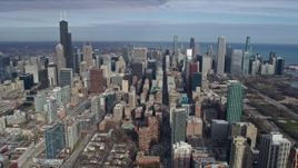 4K aerial stock footage of approaching the Downtown Chicago skyscrapers along State Street, Illinois Aerial Stock Footage | AX0165_0050