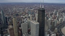 4K aerial stock footage approach and fly around John Hancock Center skyscraper, Downtown Chicago, Illinois Aerial Stock Footage | AX0165_0079