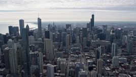 4K aerial stock footage of flying past the city's downtown skyscrapers, Downtown Chicago, Illinois Aerial Stock Footage | AX0165_0080
