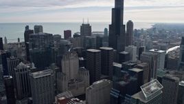 4K aerial stock footage of flying past the city's downtown skyscrapers, Downtown Chicago, Illinois Aerial Stock Footage | AX0165_0081