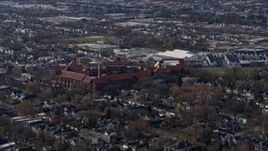 4K aerial stock footage of flying past a high school in Northwest Side Chicago, Illinois Aerial Stock Footage | AX0166_0012