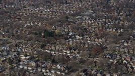 4K aerial stock footage of flying by urban homes in Northwest Side Chicago, Illinois Aerial Stock Footage | AX0166_0015
