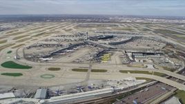 4K aerial stock footage of flying over terminals at O'Hare International Airport, Chicago, Illinois Aerial Stock Footage | AX0166_0019