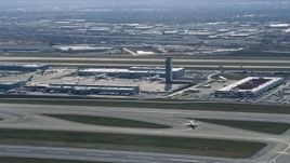 4K aerial stock footage of the control tower and terminals at O'Hare International Airport, Chicago, Illinois Aerial Stock Footage | AX0166_0021