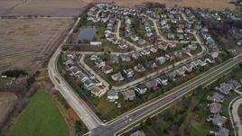 4K aerial stock footage of tract homes near Hendrick Lake in Lindenhurst, Illinois Aerial Stock Footage | AX0166_0043