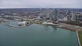 4K aerial stock footage of reverse view of skyscrapers and lakefront museums in Milwaukee, Wisconsin Aerial Stock Footage | AX0166_0077
