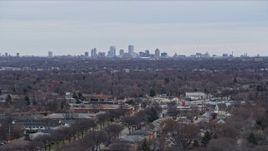 4K aerial stock footage of ascending for a wide view of the downtown skyline, Milwaukee, Wisconsin Aerial Stock Footage | AX0167_0001