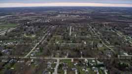 4K aerial stock footage of flying over suburban residential neighborhoods in Franklin, Wisconsin Aerial Stock Footage | AX0167_0037