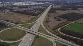4K aerial stock footage of following the Tri-State Tollway freeway through Waukegan, Illinois Aerial Stock Footage | AX0167_0056