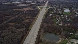 4K aerial stock footage of light traffic on the Tri-State Tollway freeway through Waukegan, Illinois Aerial Stock Footage | AX0167_0057
