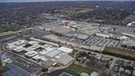 4K aerial stock footage of flying over high school and the Westfield Old Orchard shopping mall in Skokie, Illinois Aerial Stock Footage | AX0167_0071