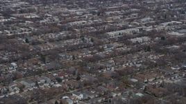 4K aerial stock footage of passing by urban neighborhoods in Northwest Side Chicago, Illinois Aerial Stock Footage | AX0167_0075