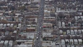 4K aerial stock footage of a busy street by urban neighborhoods in Northwest Side Chicago, Illinois Aerial Stock Footage | AX0167_0076