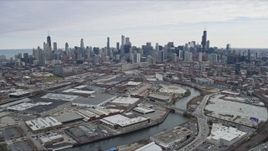 4K aerial stock footage of following the river toward the Downtown Chicago skyline, Chicago, Illinois Aerial Stock Footage | AX0167_0083