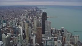 4K aerial stock footage of a view of skyscrapers around John Hancock Center, Downtown Chicago, Illinois Aerial Stock Footage | AX0167_0104