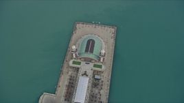 4K aerial stock footage of slowly flying over Navy Pier and tilt to bird's eye view, Downtown Chicago, Illinois Aerial Stock Footage | AX0167_0106