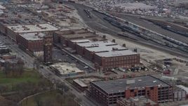 4K aerial stock footage of flying past factory buildings on the Southwest Side Chicago, Illinois Aerial Stock Footage | AX0168_0006