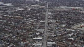 4K aerial stock footage of following Archer Avenue past urban neighborhoods on the Southwest Side Chicago, Illinois Aerial Stock Footage | AX0168_0007
