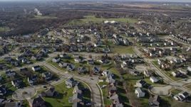 4K aerial stock footage of flying over a residential neighborhood in Lockport, Illinois Aerial Stock Footage | AX0168_0030