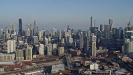4K aerial stock footage of a wide view of Downtown Chicago skyscrapers and city buildings, Illinois Aerial Stock Footage | AX0169_0025