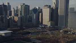 4K aerial stock footage ascend from lake to reveal iconic landmarks in Grant Park, Downtown Chicago, Illinois Aerial Stock Footage | AX0169_0039