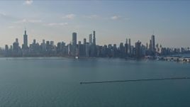 4K aerial stock footage of a wide view of the city's downtown skyline, reveal Navy Pier, Downtown Chicago, Illinois Aerial Stock Footage | AX0169_0054