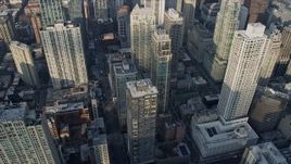4K aerial stock footage tilt and fly past downtown skyscrapers, Downtown Chicago, Illinois Aerial Stock Footage | AX0169_0063