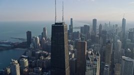 4K aerial stock footage of the top of the John Hancock Center skyscraper, Downtown Chicago, Illinois Aerial Stock Footage | AX0169_0069