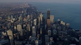 4K aerial stock footage of flying across the downtown area of the city toward Lincoln Park, Downtown Chicago, Illinois Aerial Stock Footage | AX0169_0088