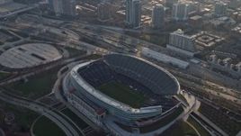 4K aerial stock footage approach Soldier Field and tilt to a bird's eye view of the field, Chicago, Illinois Aerial Stock Footage | AX0169_0101