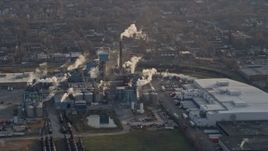 4K aerial stock footage of flying by a factory in Southwest Side Chicago, Illinois Aerial Stock Footage | AX0169_0103